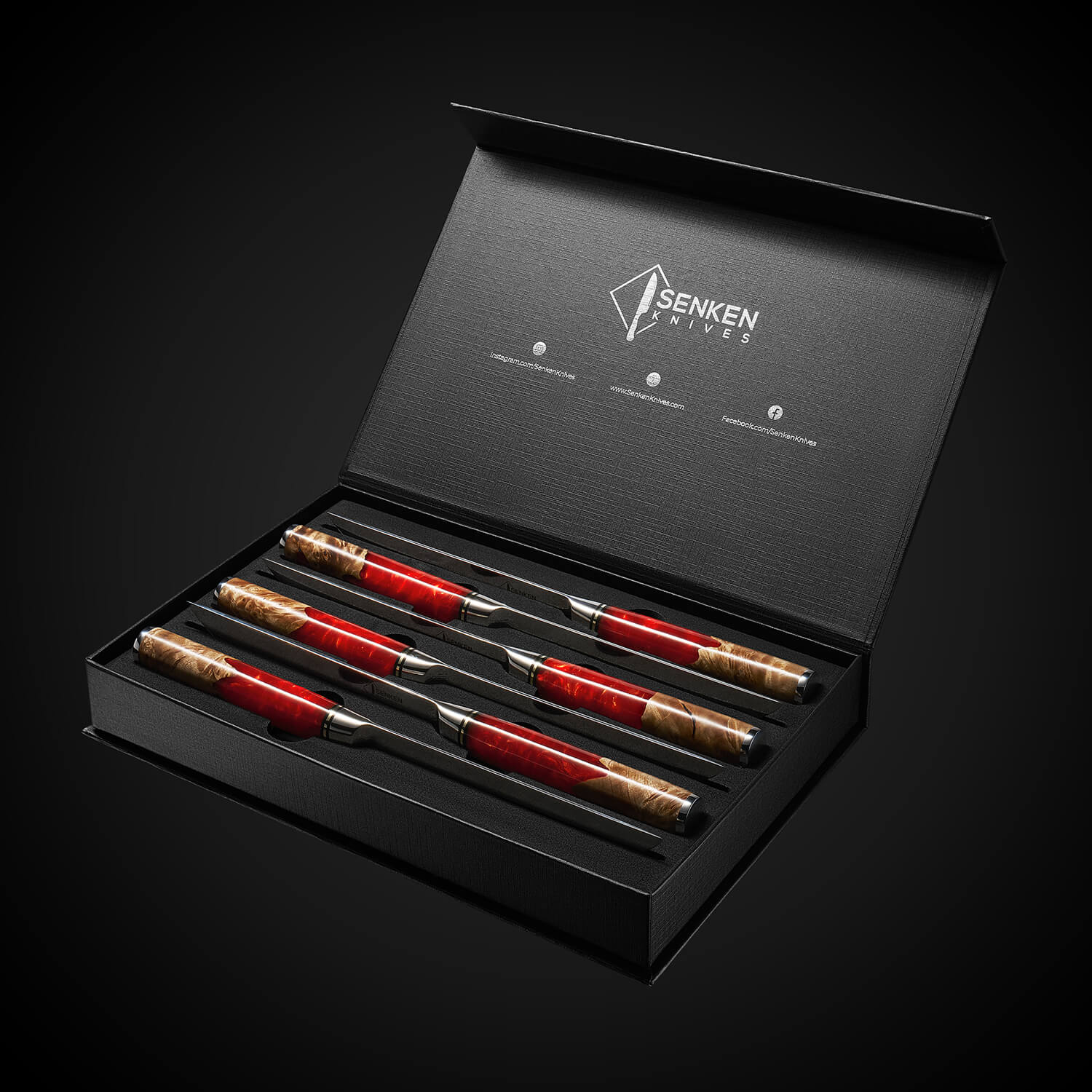 Set of red knives in a black box with 'Senken Knives' branding on a dark background