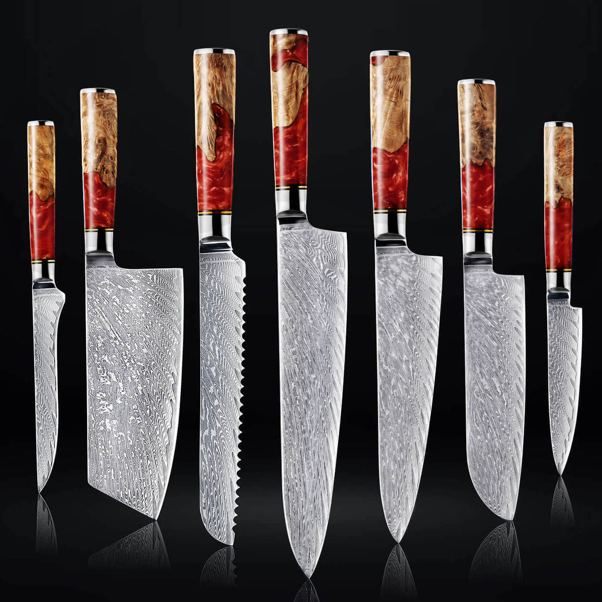 Seven kitchen knives with patterned Damascus steel blades and red resin wood wood handles with red inlay, arranged upright on a black reflective background.