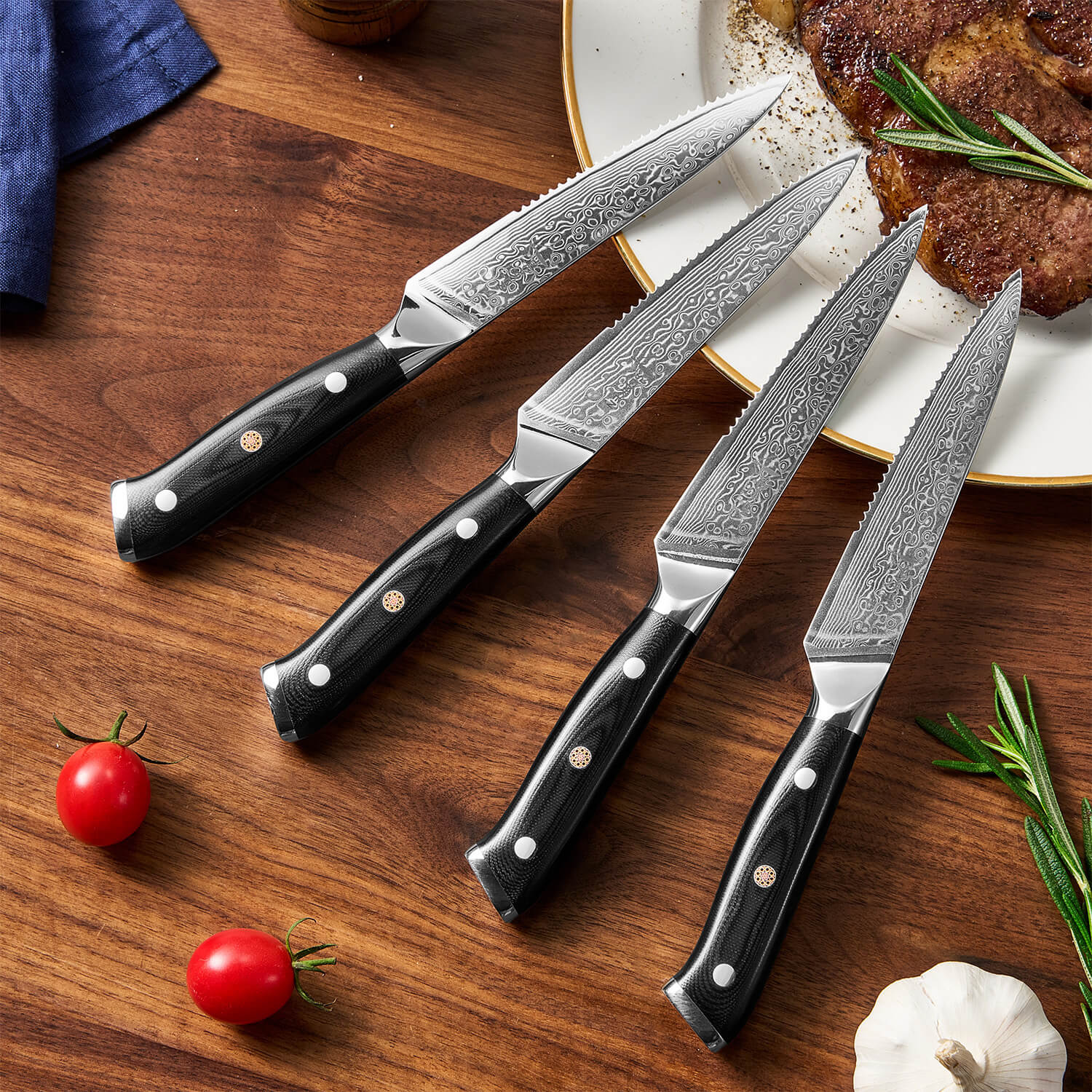 Shogun 4-Piece Japanese Damascus Steel Steak Knife Set on kitchen countertop