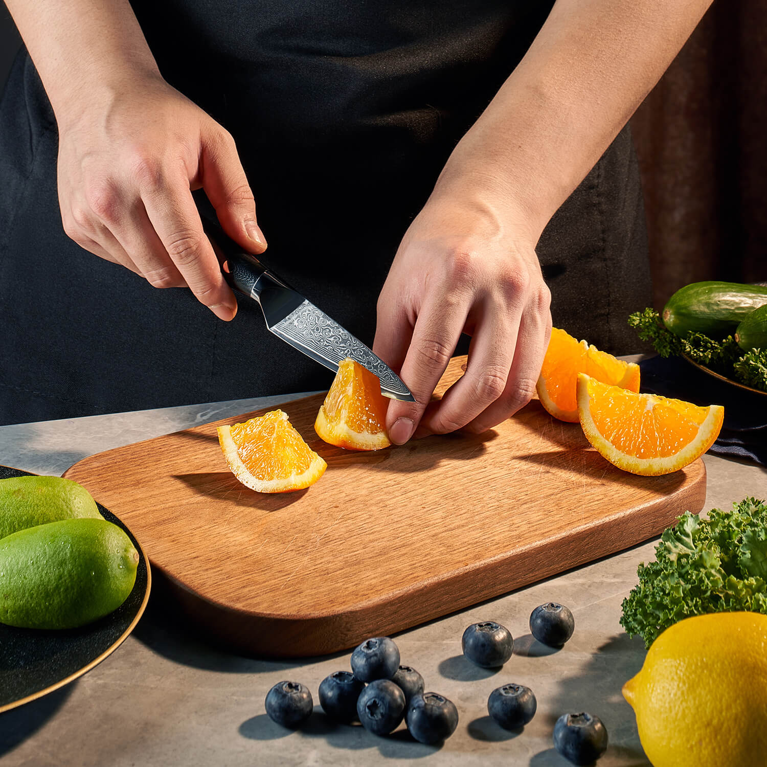 Shogun Damascus Paring Knife Black G10 Handle by Senken Knives Main Image Cutting Fruit