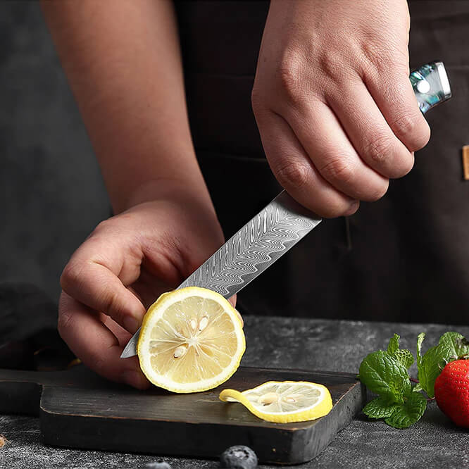 Umi Utility Knife Slicing Lemon