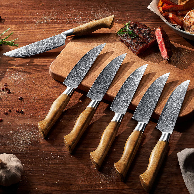 6 Damascus Steel Steak Knives with Sycamore Wood Handles on Cutting Board