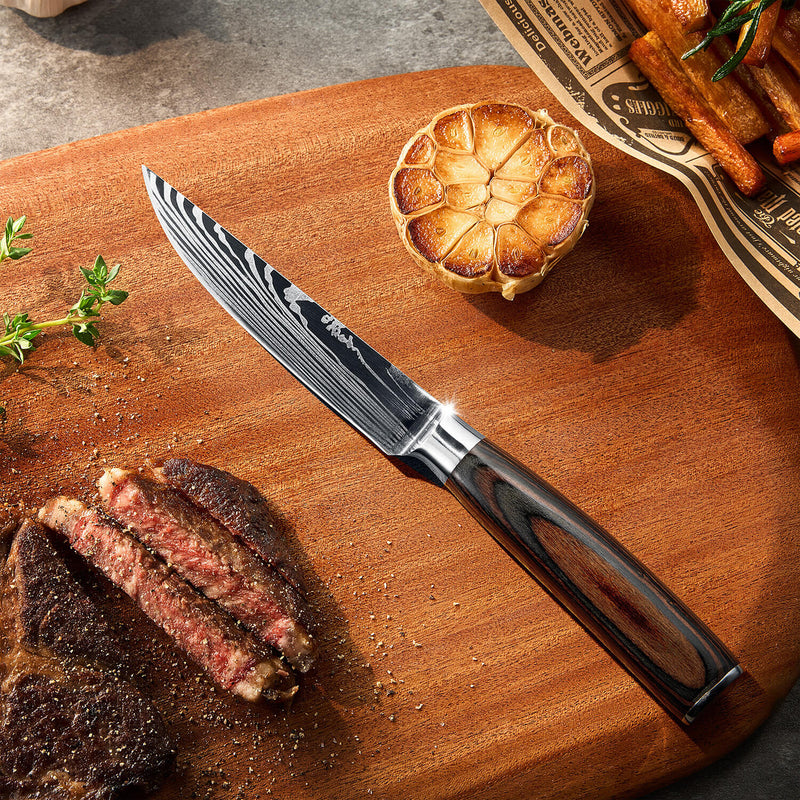 Steak Knife on Cutting Board with Cut Steak