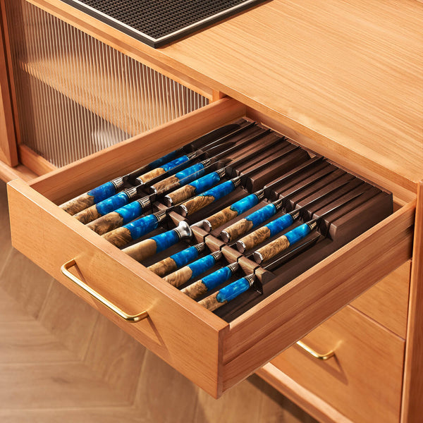 Knives in a Kitchen Block inside of a kitchen drawer