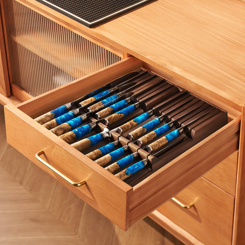 Knives in a Kitchen Block inside of a kitchen drawer