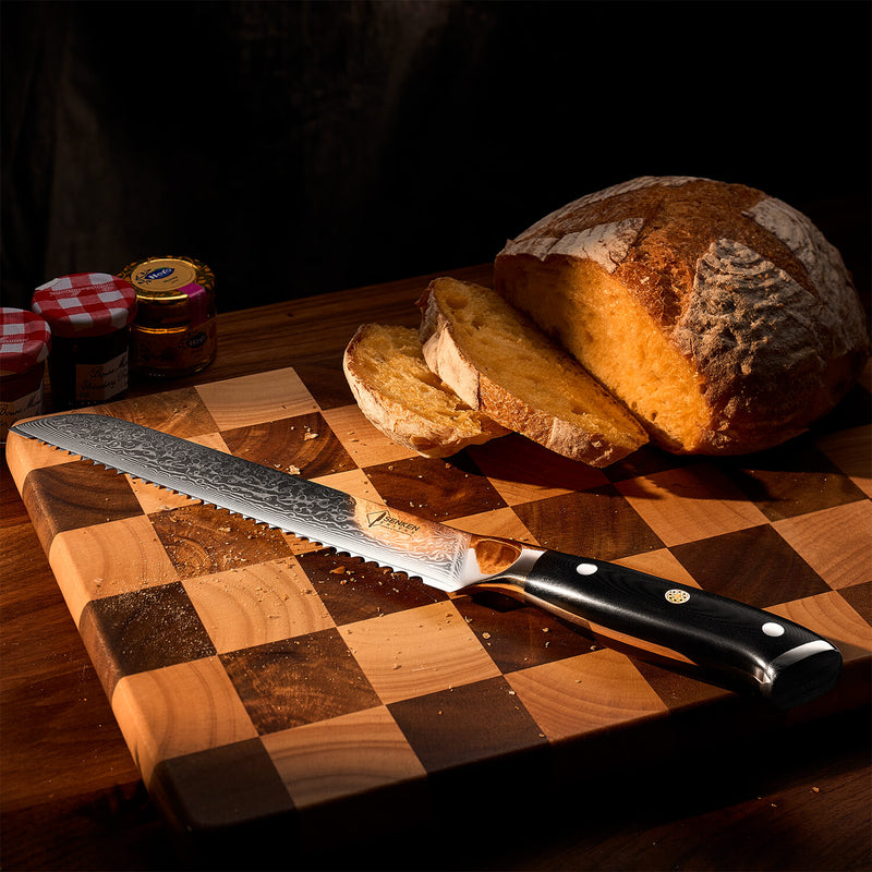 Shogun Damascus Steel Bread Knife Black G10 Military Grade Fiber Handle on Cutting Board Serrated Blade