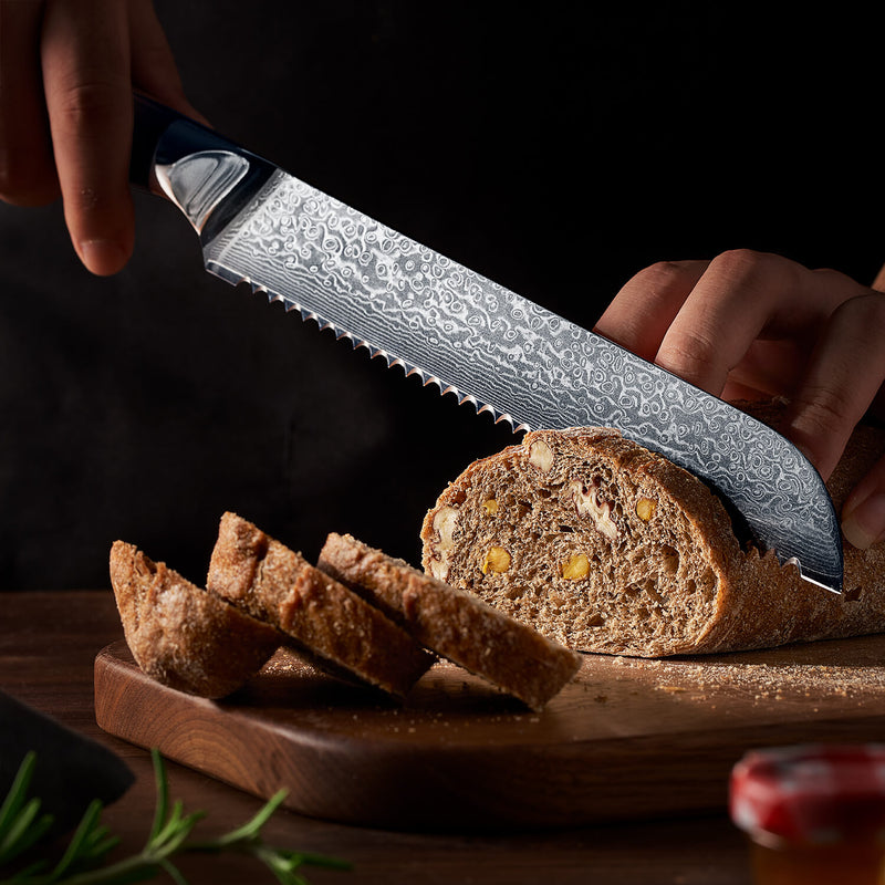 Shogun Damascus Steel Bread Knife Black G10 Military Grade Fiber Handle Closeup Cutting Loaf Baguette