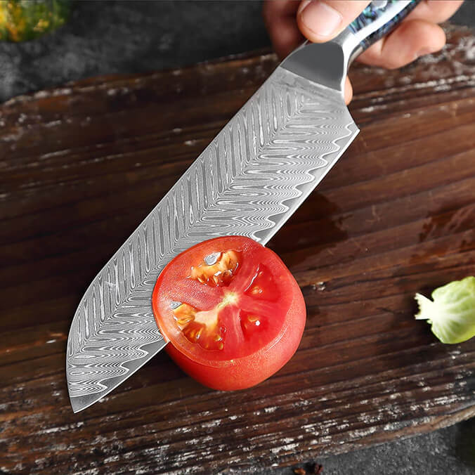 Umi Japanese Damascus Santoku Knife Cutting Tomato
