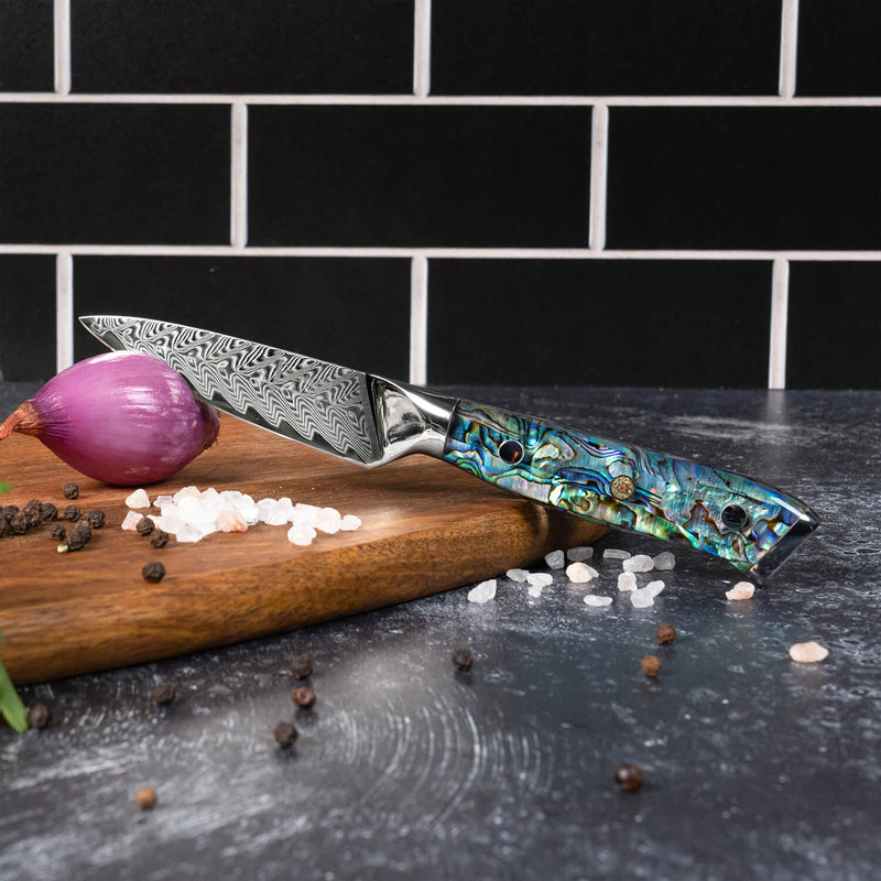 Umi 3.5" Paring Knife with Abalone Shell Handle Lifestyle Kitchen Shot Shallot