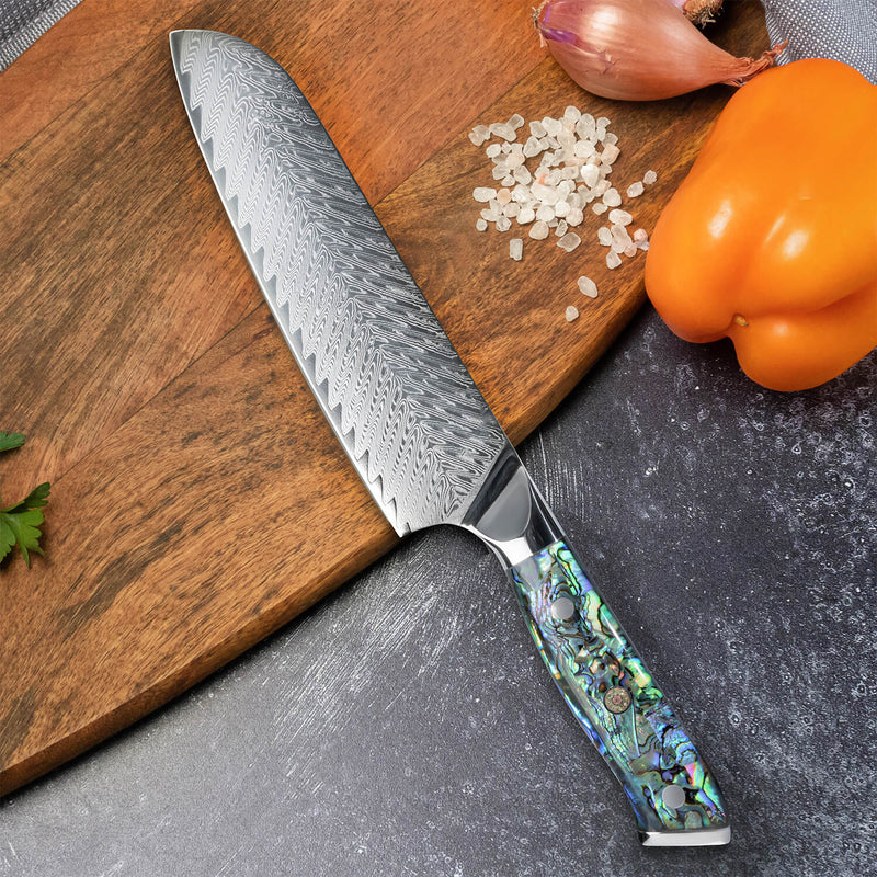 Umi Japanese Damascus Santoku Knife on Cutting Board