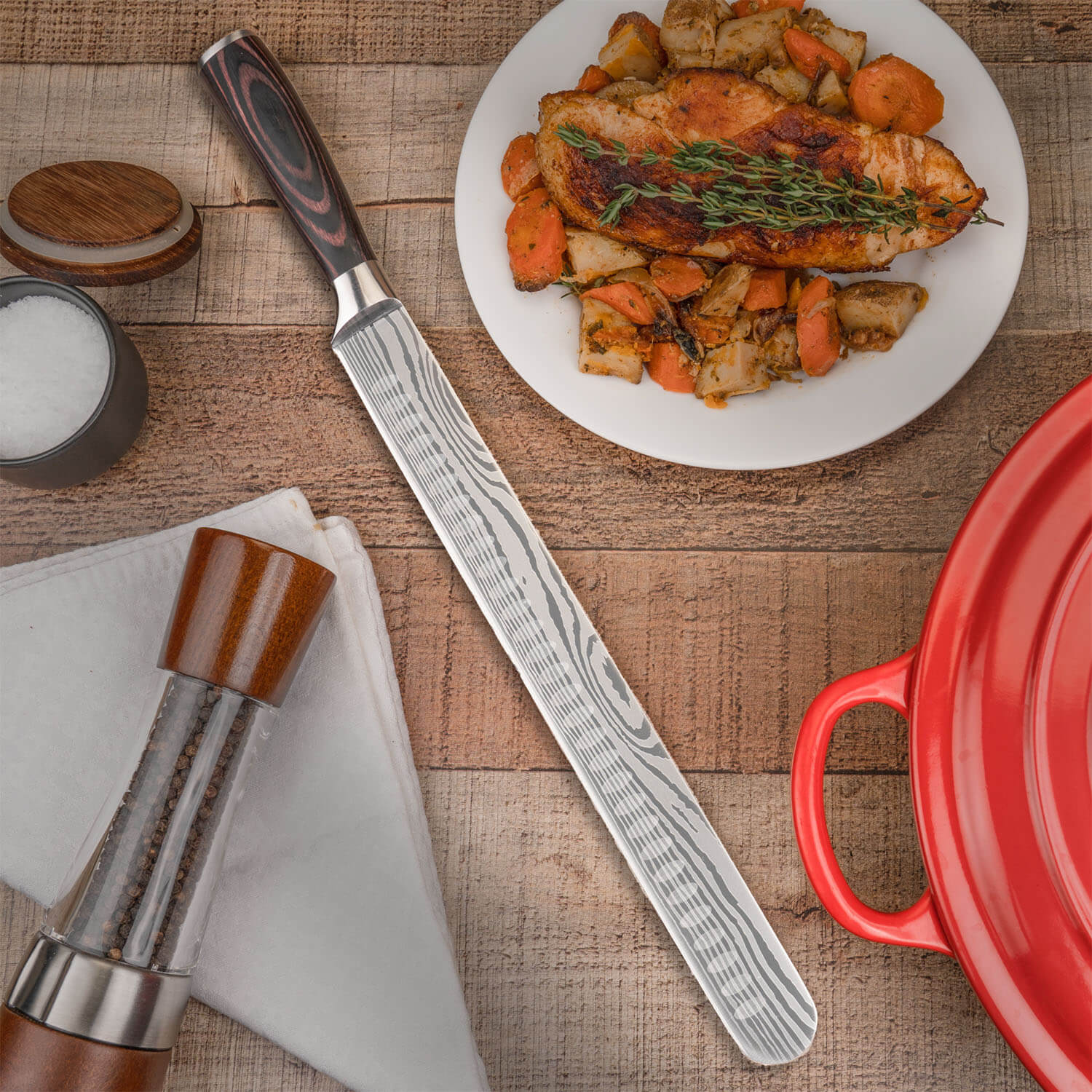 Long Brisket Knife with Damascus Pattern on Kitchen Table