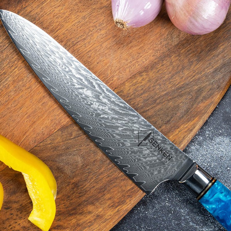 Tsunami Damascus Steel Chef Knife 8 Inch Japanese Steel Natural Wood Blue Resin Handle Blade Close Up